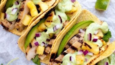 Grilled pineapple chicken tacos with avocado crema