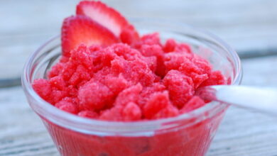 Strawberry granita with pistachios and cream