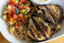 Roasted eggplant and lentil bowl with garlic yogurt sauce