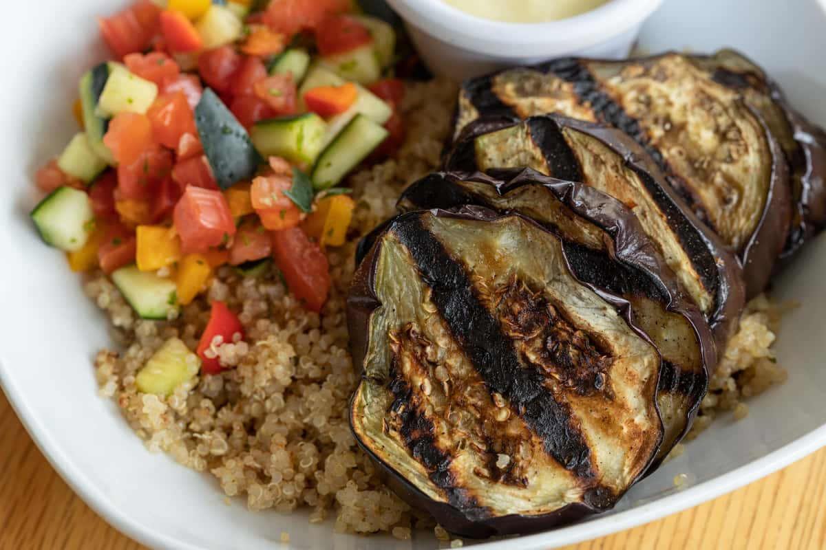 Roasted eggplant and lentil bowl with garlic yogurt sauce