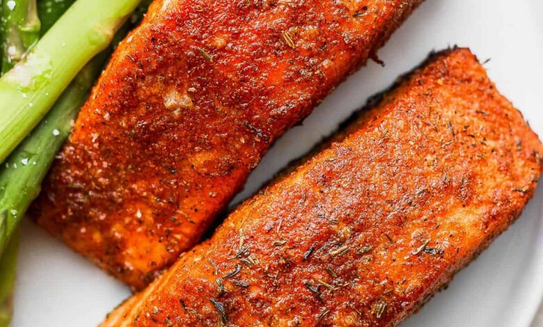 Air fryer salmon with arugula berry salad