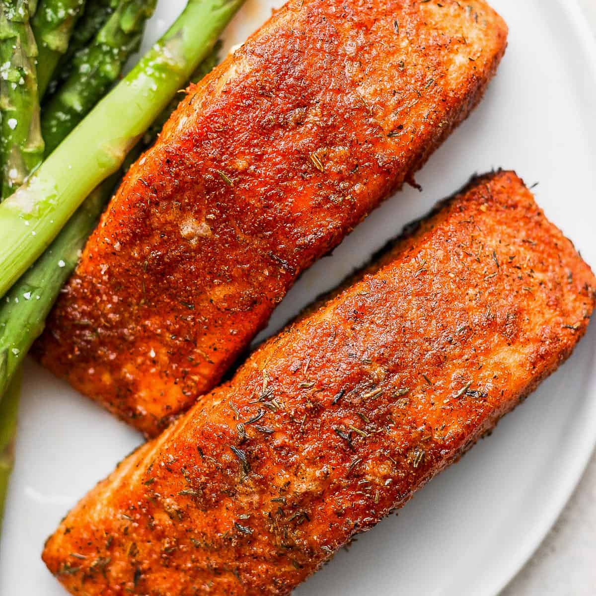 Air fryer salmon with arugula berry salad