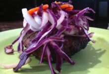 Spicy burgers with tahini sauce and harissa carrot slaw