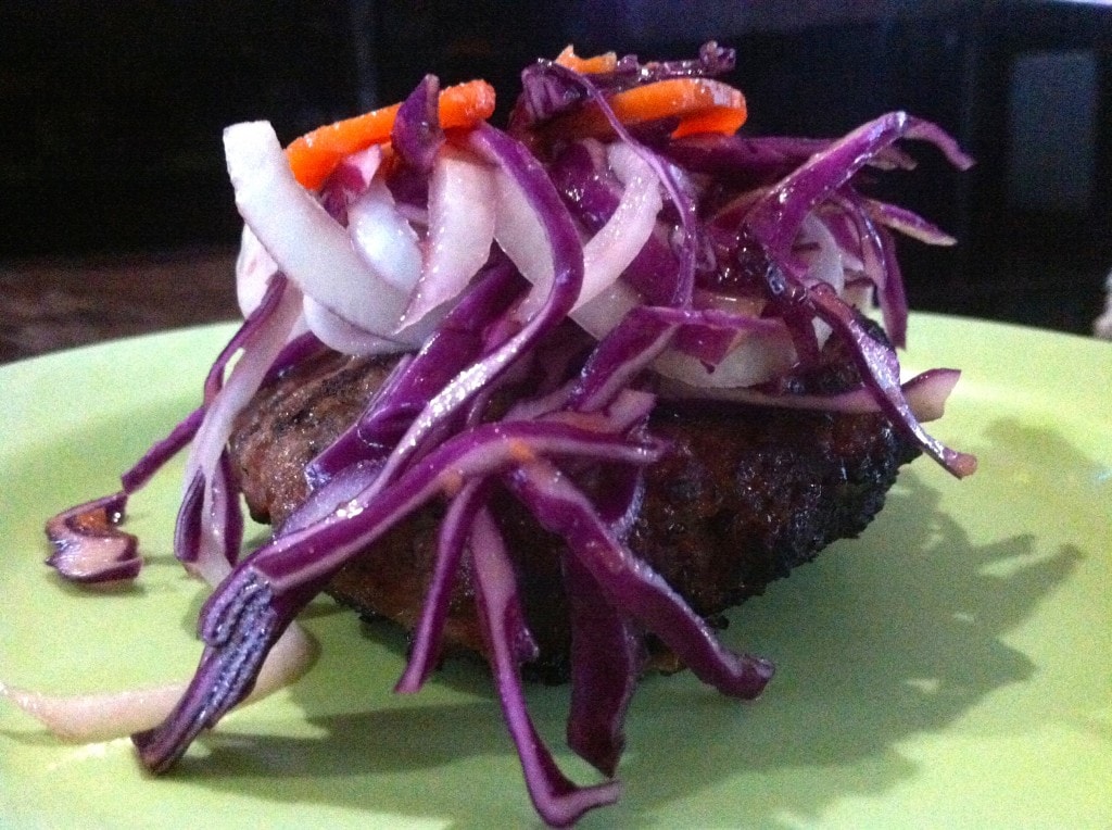 Spicy burgers with tahini sauce and harissa carrot slaw