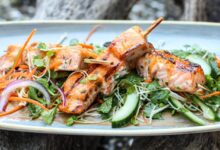 Curry rubbed salmon skewers with spinach raita