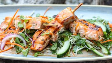 Curry rubbed salmon skewers with spinach raita