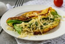 Scrambled eggs with parmesan spinach