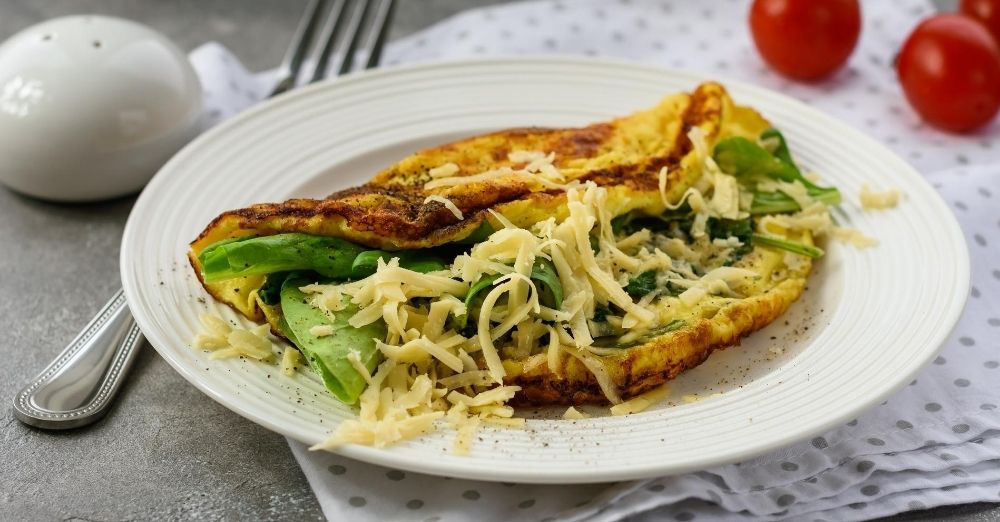 Scrambled eggs with parmesan spinach
