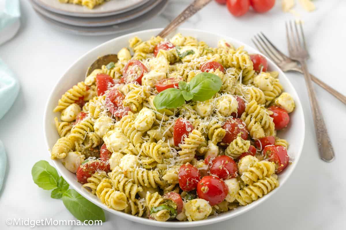 Pesto pasta salad with tomatoes and mozzarella