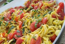 Yellow squash noodles in tomato basil sauce