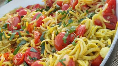 Yellow squash noodles in tomato basil sauce