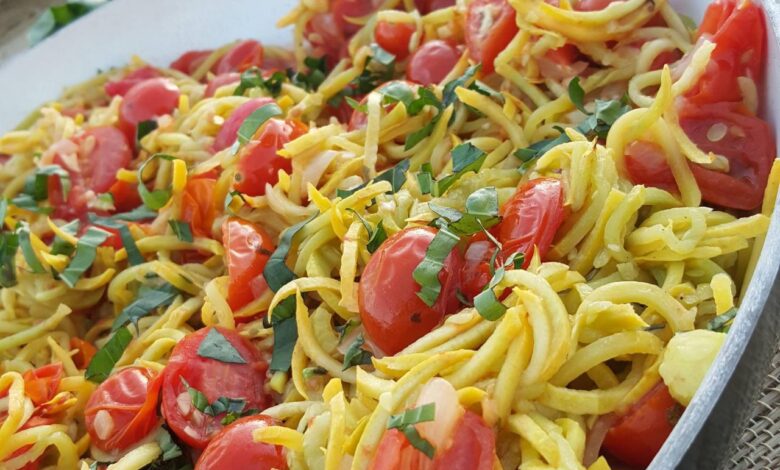 Yellow squash noodles in tomato basil sauce