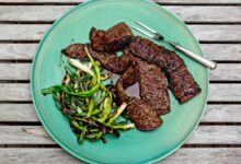 Grilled skirt steak with cucumber and corn salad