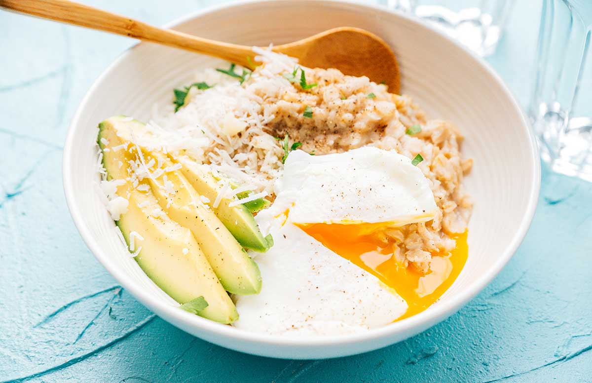 Savory oatmeal bowl with poached egg