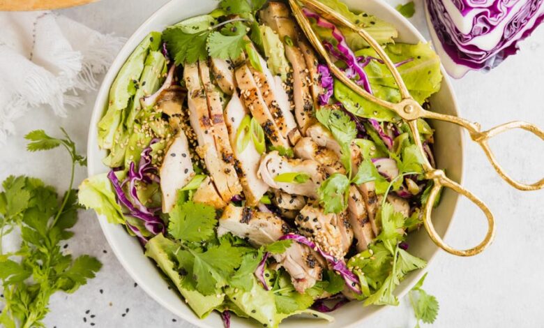 Shredded vegetable salad with sesame chicken strips