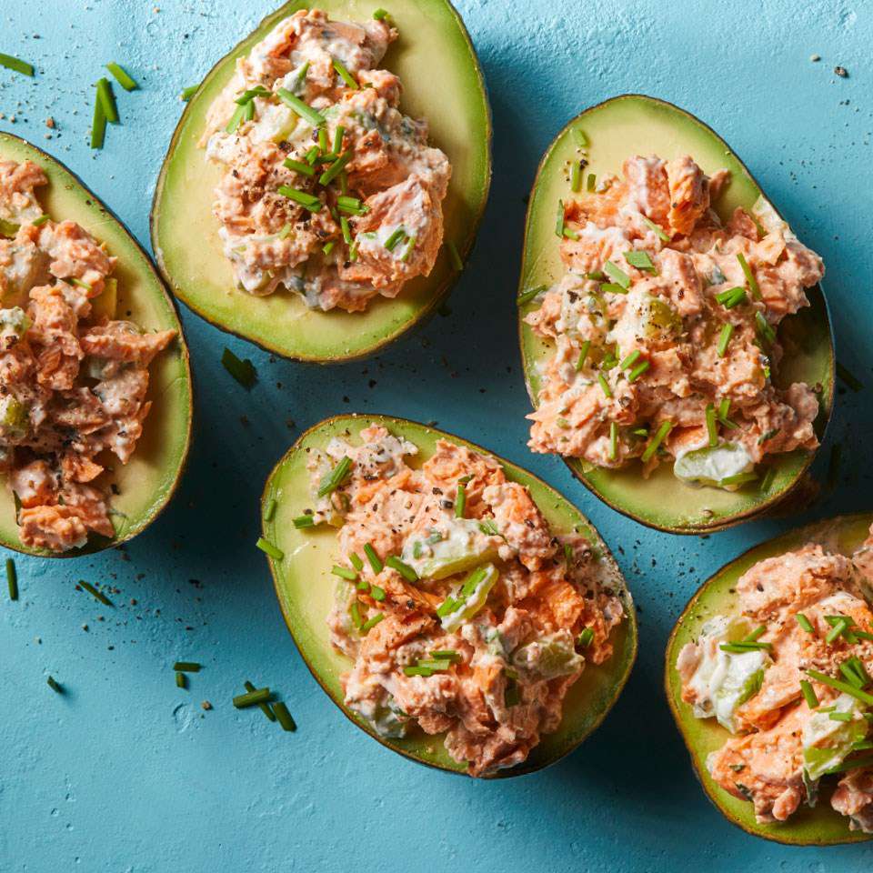 Coconut poached salmon stuffed avocados