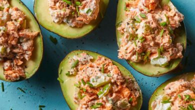 Coconut poached salmon stuffed avocados