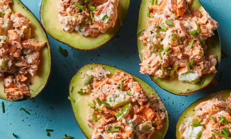 Coconut poached salmon stuffed avocados