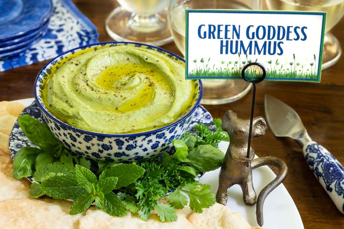 Green goddess hummus with crudites and crackers