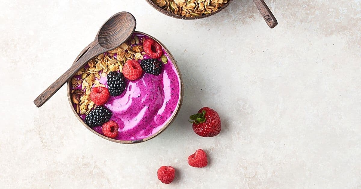 Pink cookie dragon fruit smoothie bowl